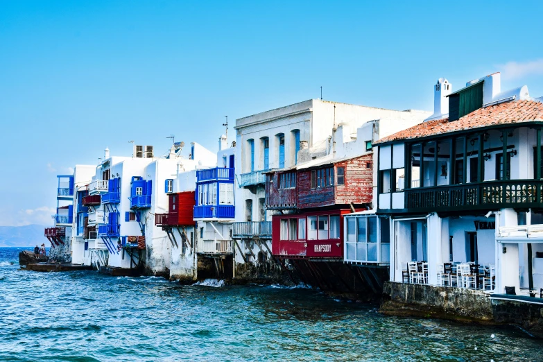 the houses along the ocean line look like they're out in real life