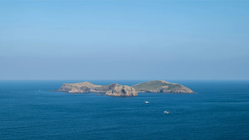 a view of a couple of islands in the ocean