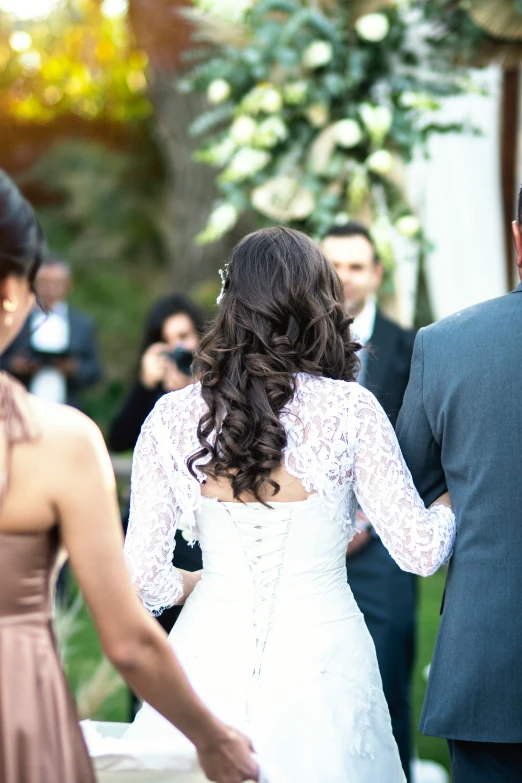 the bride and groom are standing near each other