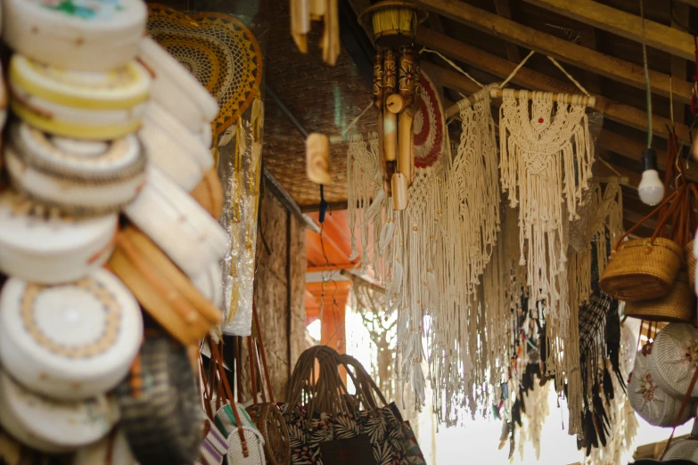 many different items hanging from a wood structure