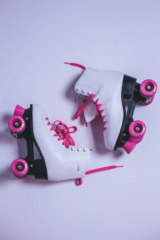 roller skates, two roller blades and one pair of shoes