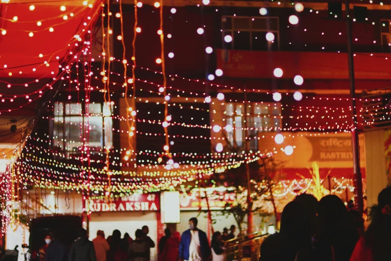 many people stand in line outside a store