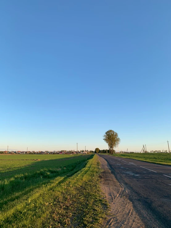 road sign on the side of a rural country road