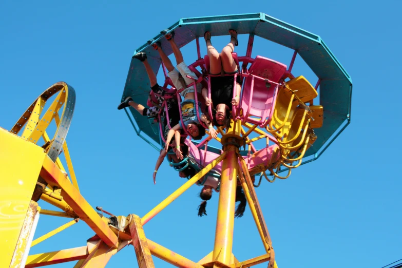 children on a ride in an amut park