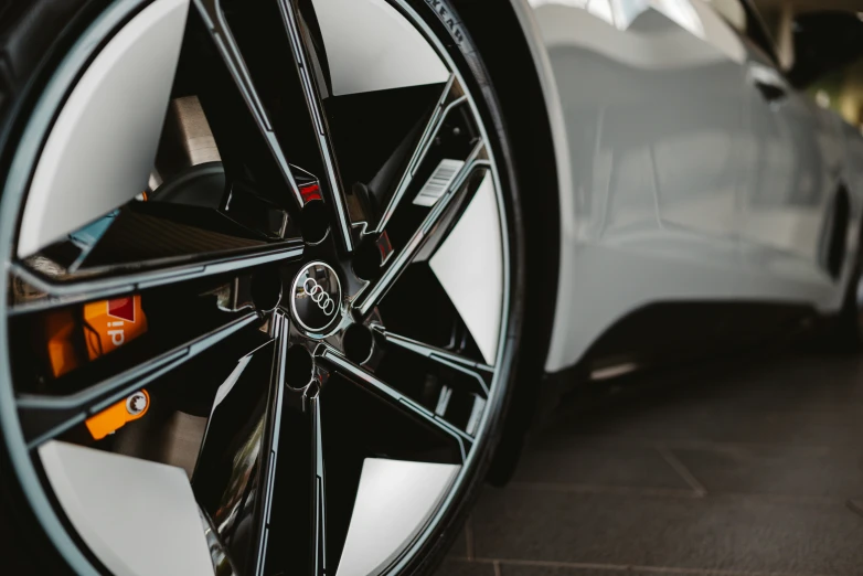 there is an automobile tire with a colorful emblem