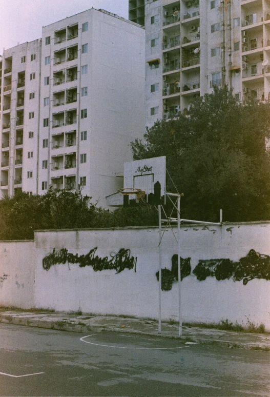 a basketball court on the side of a building