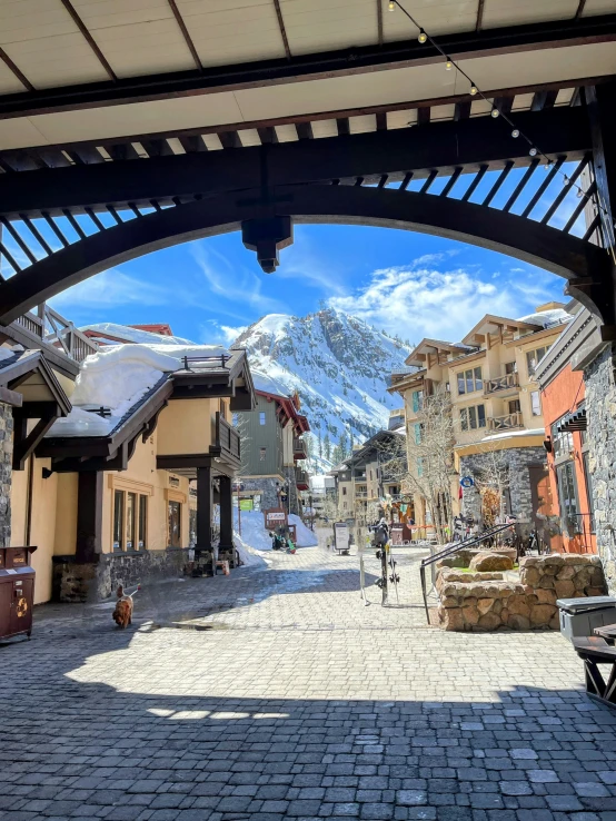 the view from a walkway that leads to a town