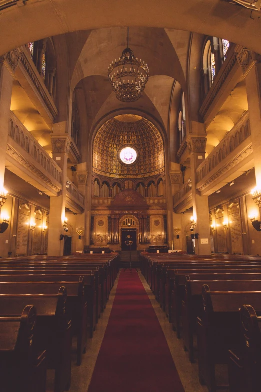 a large cathedral with lots of benches