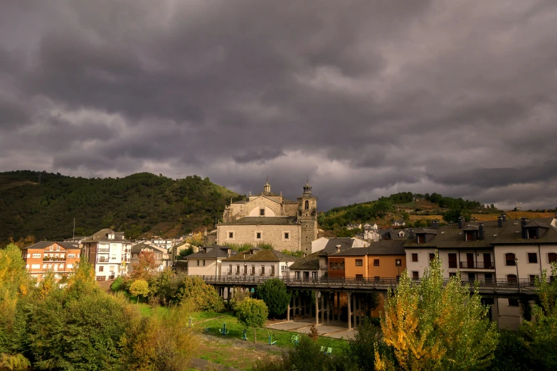 a scenic image of the city with buildings and a bridge