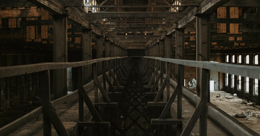 a dark and creepy, old looking building with iron balconies