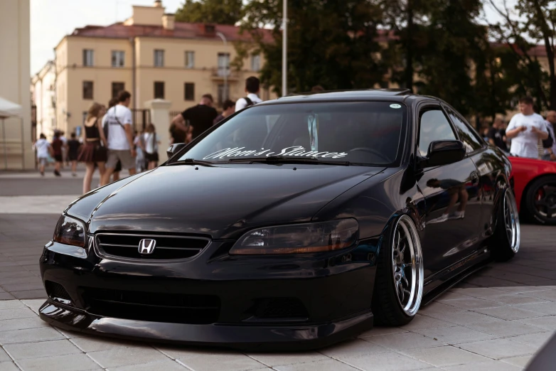 a nice looking honda civic with some silver rims