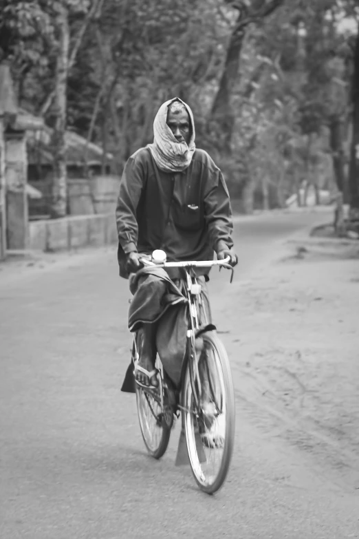 a person riding a bike on the street