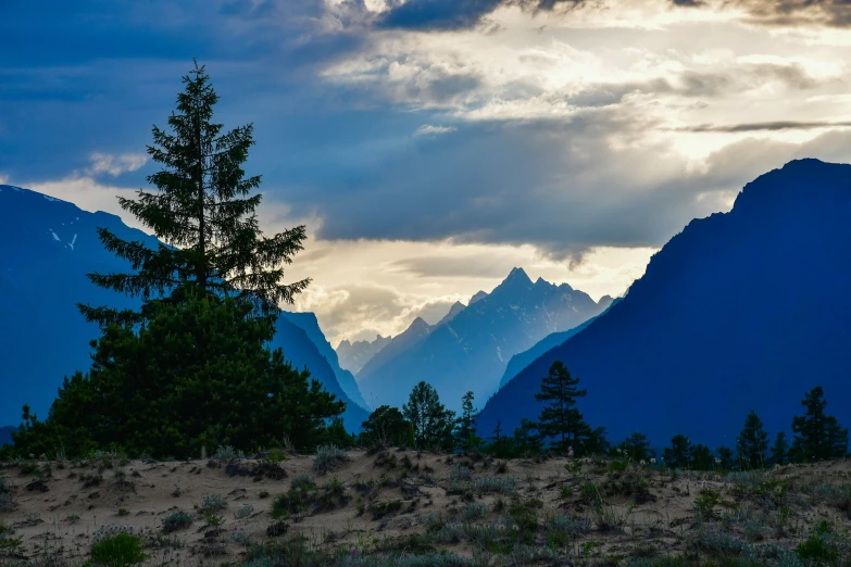 a po of a view of mountains in the sun