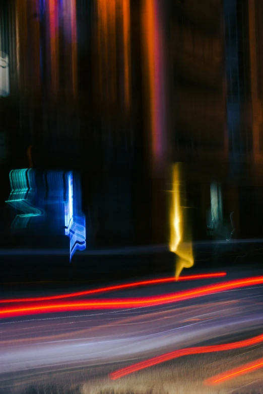 a blurry image of a person standing in the street