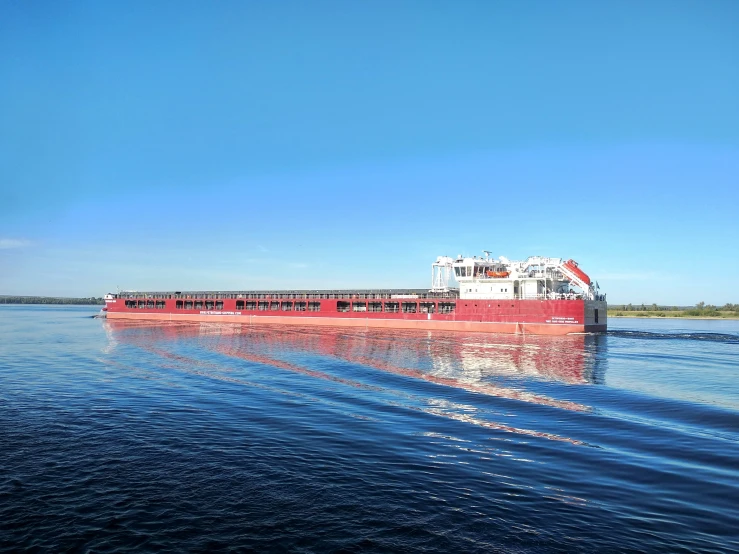 a large cargo ship in the middle of water