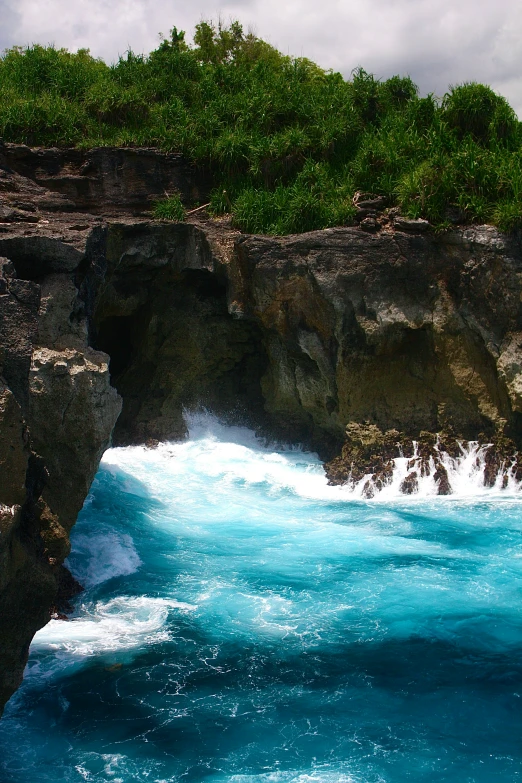 the edge of some cliffs next to the ocean