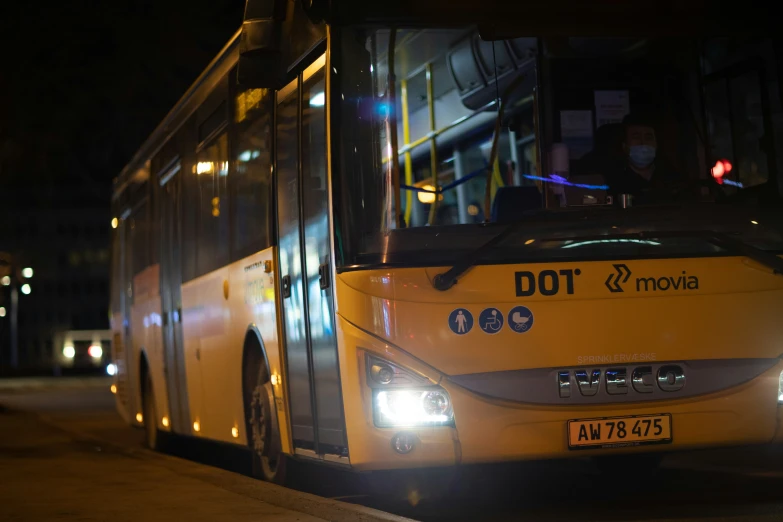 bus number 8991 is pictured at night time in the city