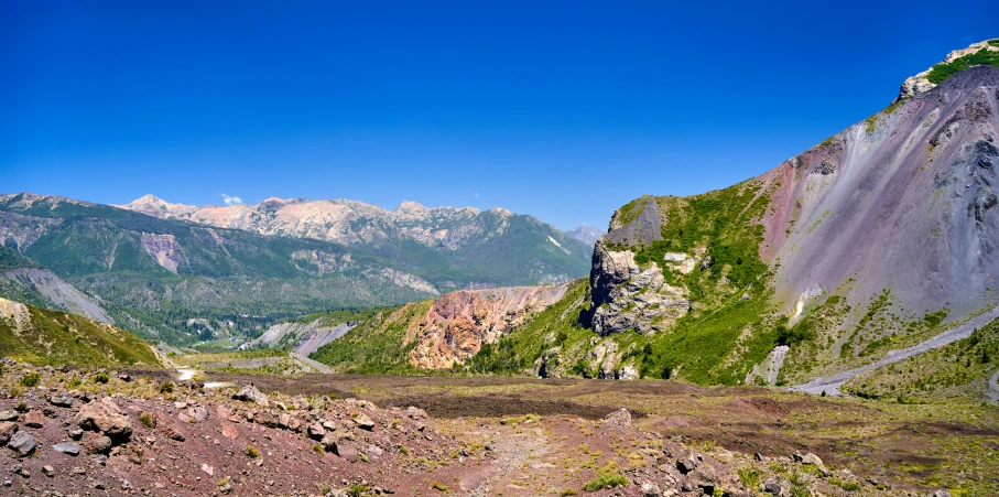 the mountain pass is steep and rocky and the landscape is full of rocks