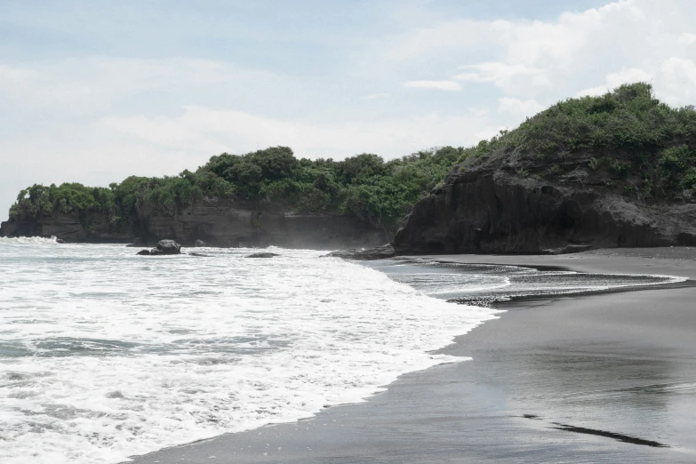 a beach with a couple of people in it