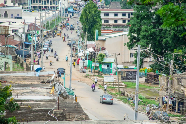 people walking on the street in town area