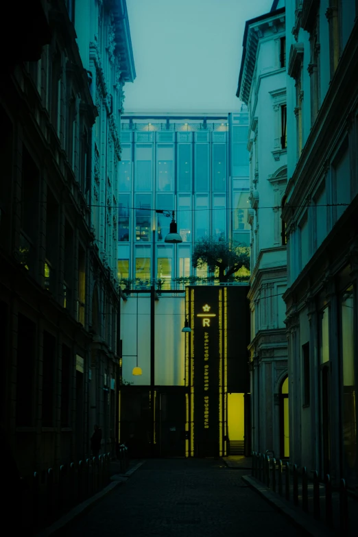 an open walkway leads to a large building