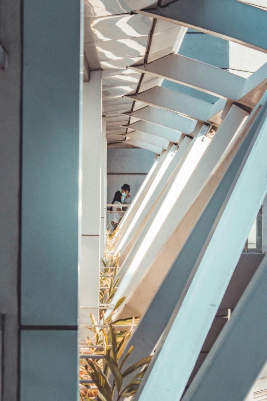 a man sitting outside in a building