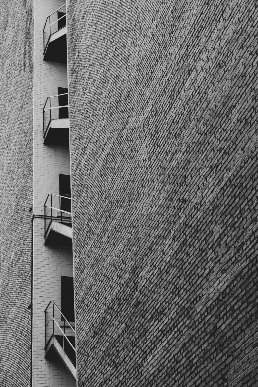 black and white pograph of two tall buildings