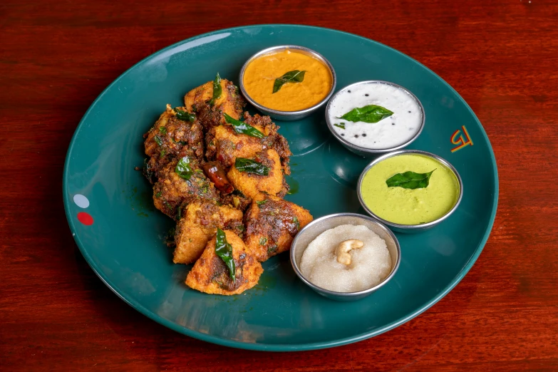 a plate with several different condiments on it