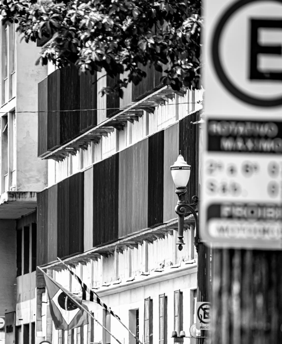 black and white po of a street light in the city