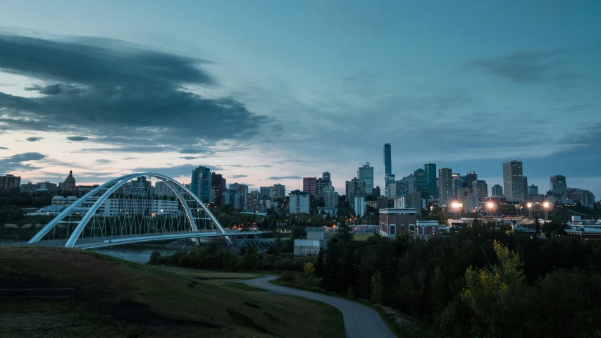 a view of a city skyline and a bridge