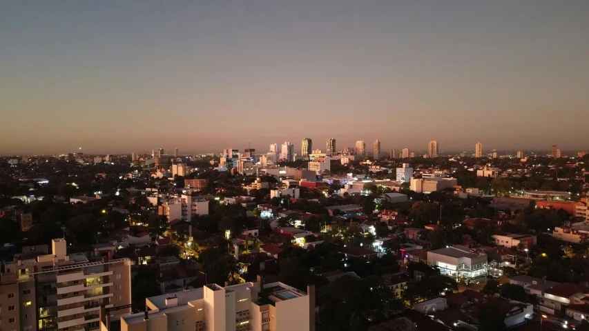 a large city at night with some tall buildings