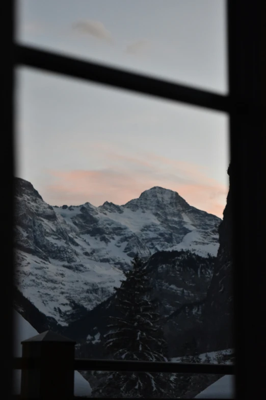 a view of the mountains out a window