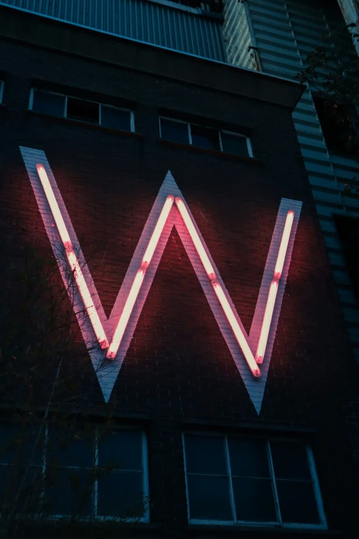 the illuminated word w is on a building