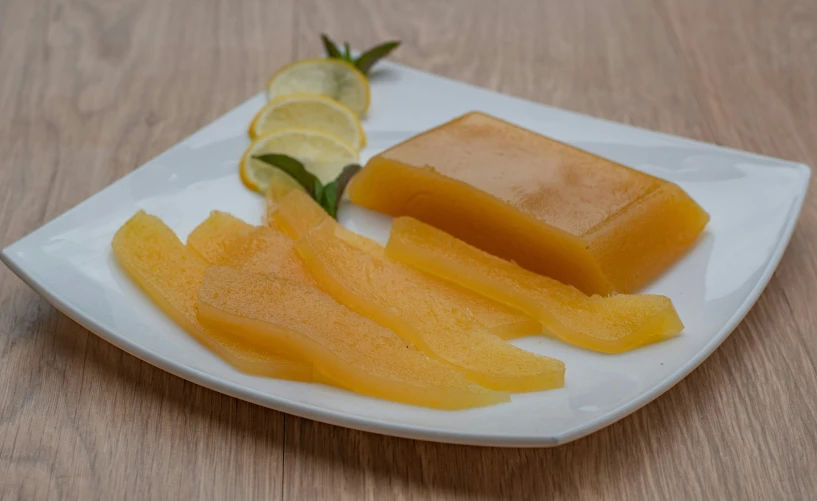 several cut up pieces of fruit on a plate