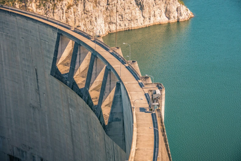 an aerial po taken of the side of a dam