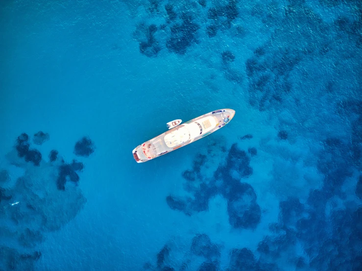 a boat sits on top of the water