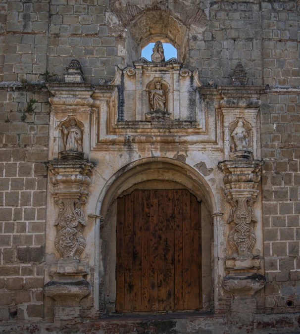 an old church with a large wooden door