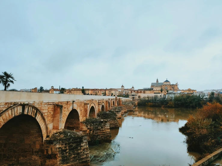 old town bridge crossing river, near village