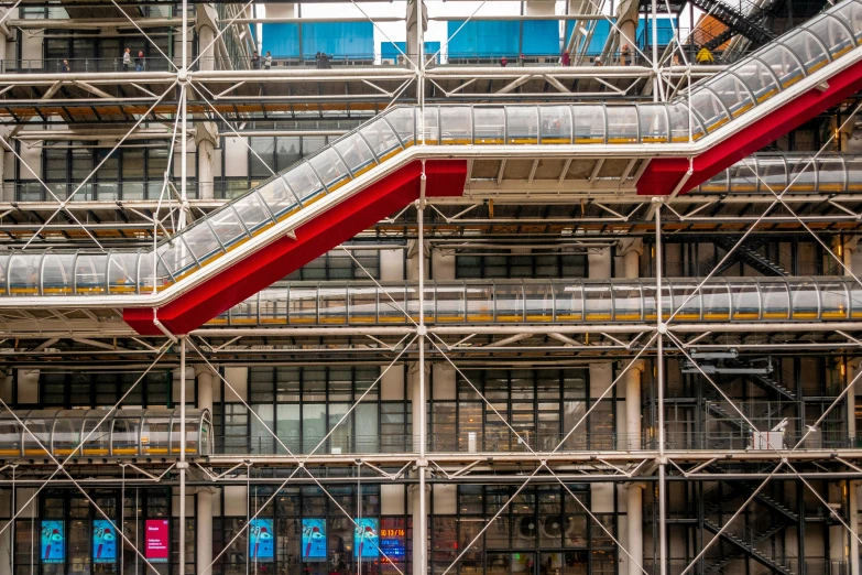 a large building with scaffolding and stairs next to it