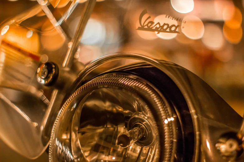 a close up po of a bike lights and spokes
