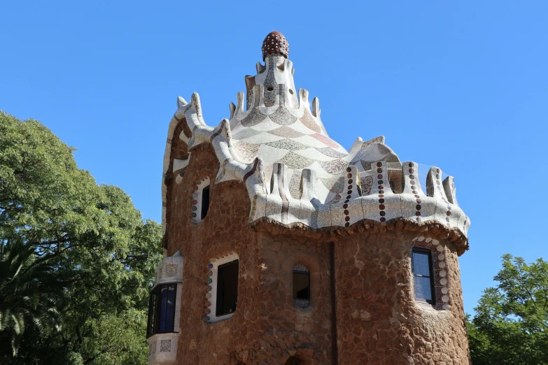 an unusual building made out of orange bricks