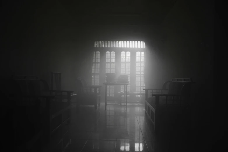 this is a po of a room with a foggy ceiling and sunbeams