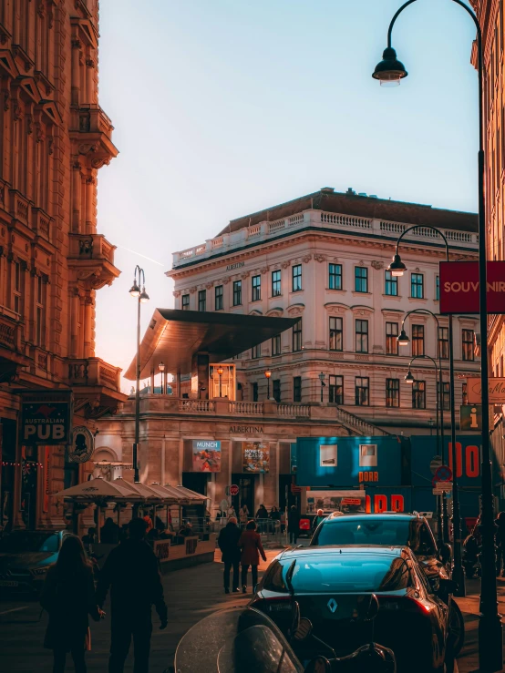 cars parked on the street in front of buildings