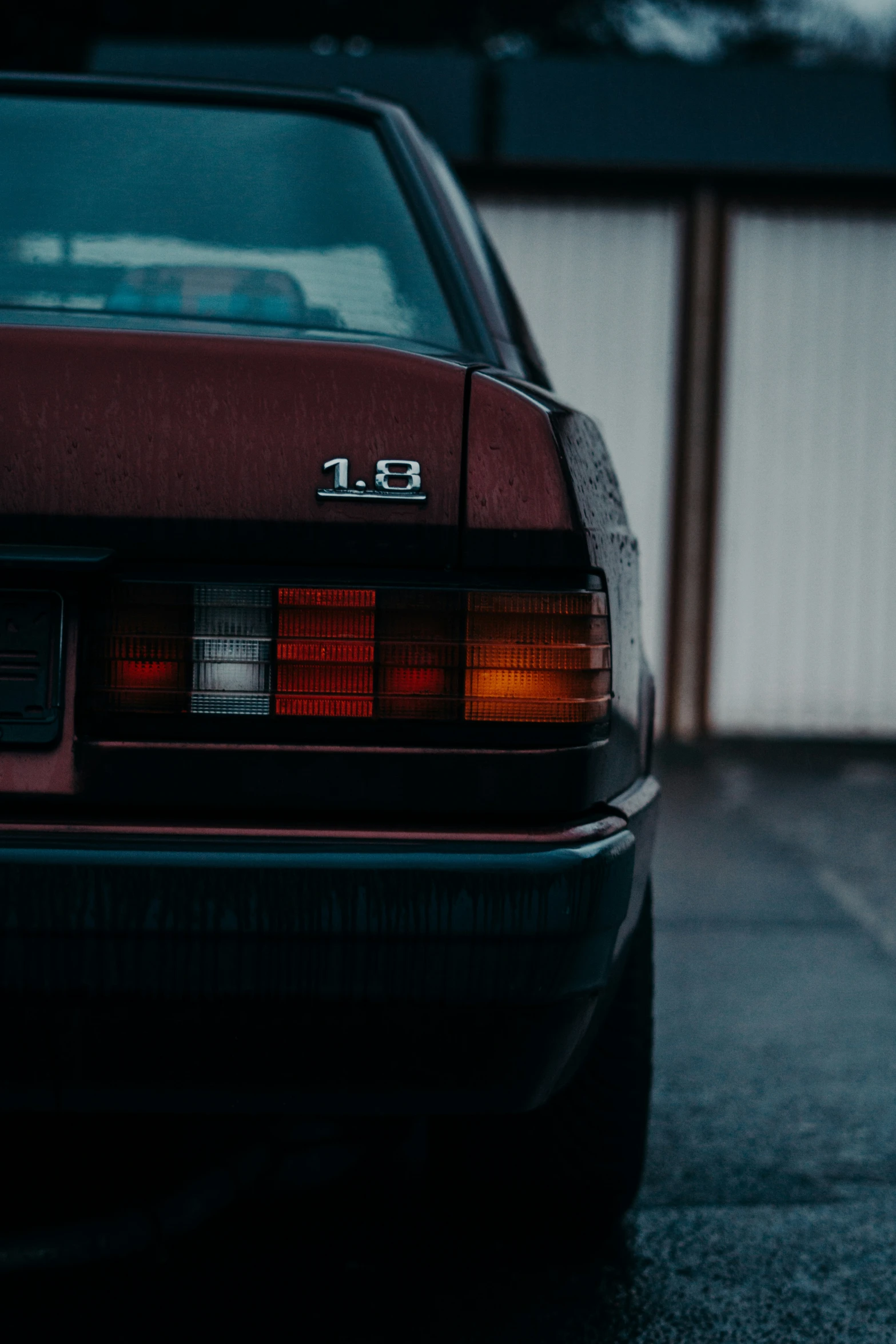 a red car parked in a garage