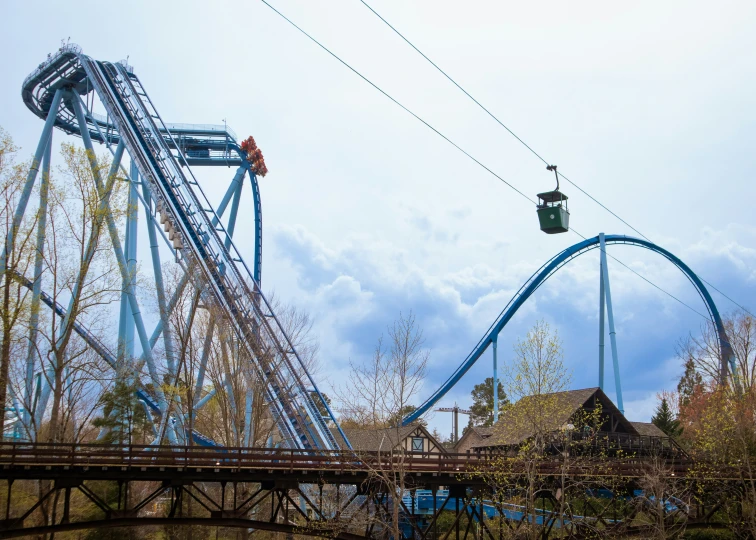 people on the coaster ride at a theme park