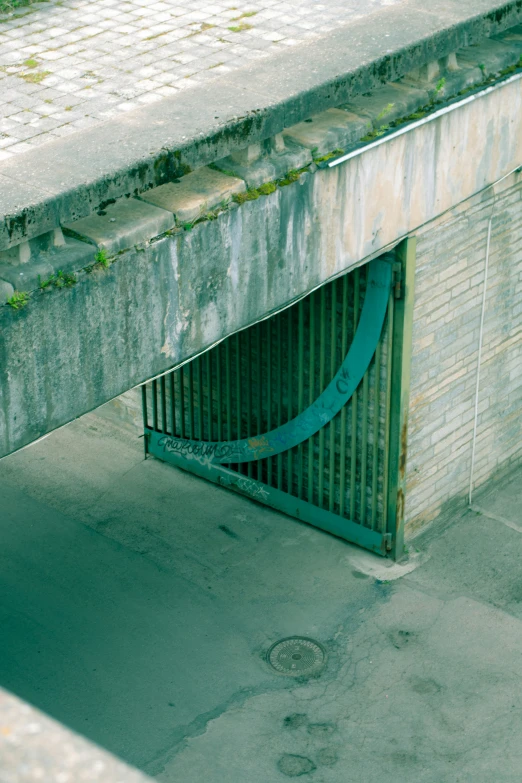 a very tall bridge over a long dirty road