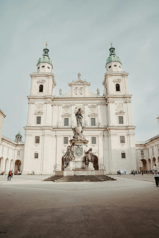 large cathedral with clock towers on a clear day