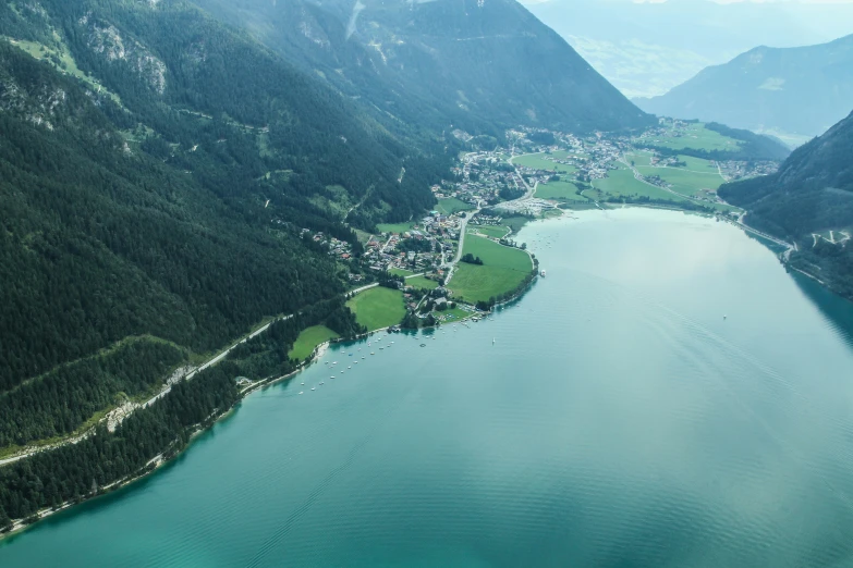 the beautiful green mountains surround a body of water