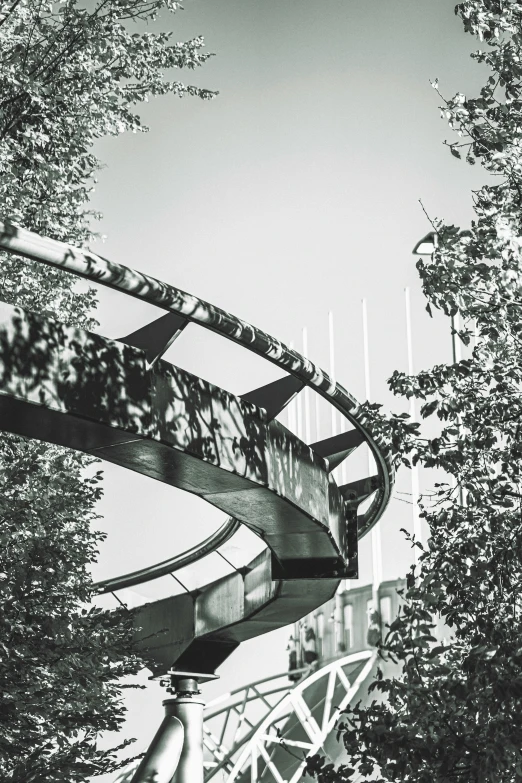 black and white pograph of a walkway that leads to a bridge