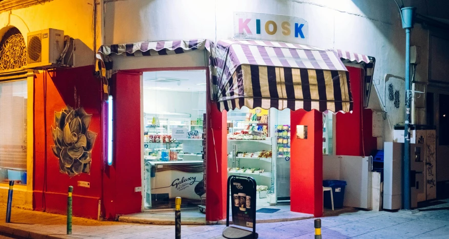 a food store in the middle of a city street